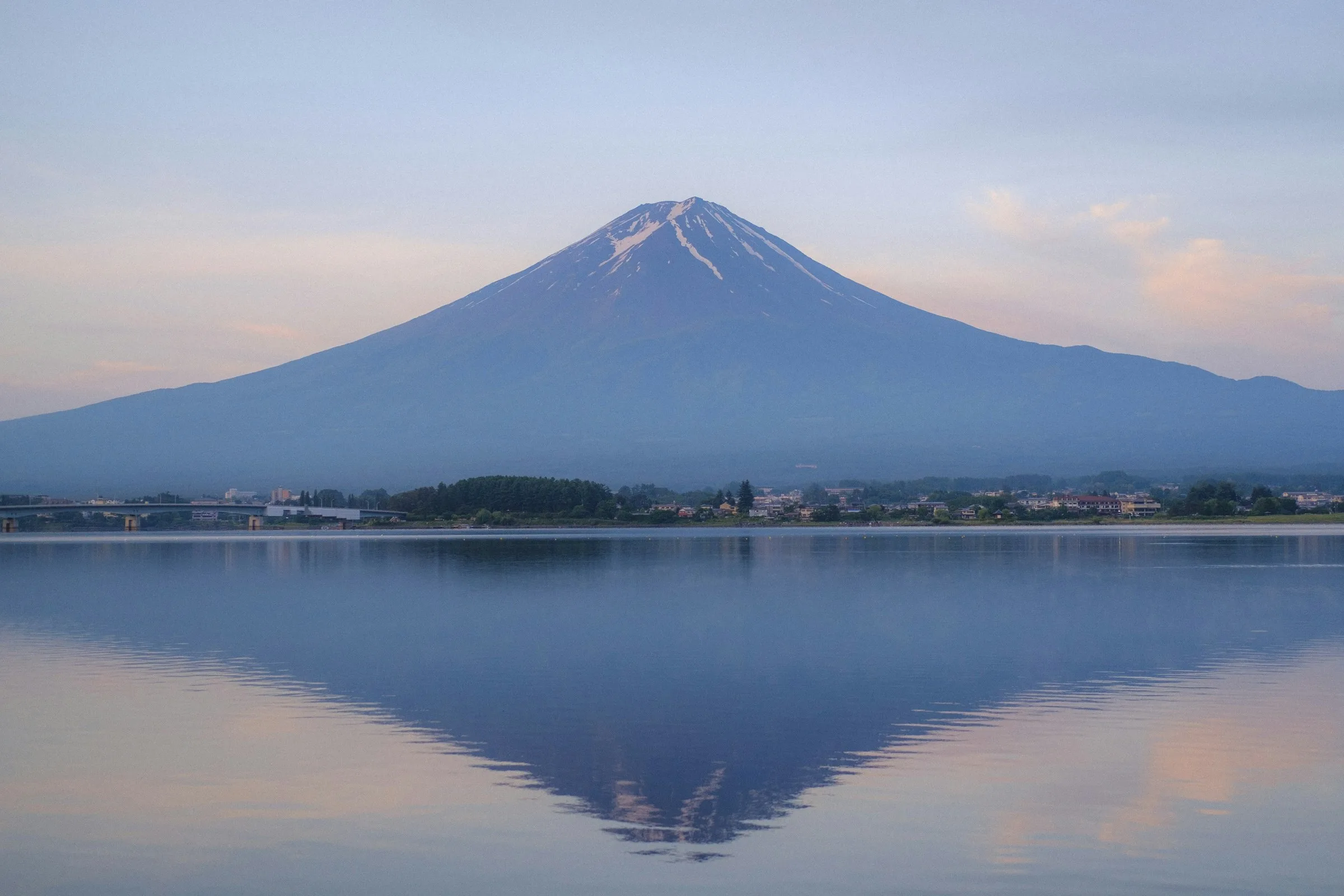 Mount Fuji rising above a lake within Fuji-Hakone-Izu National Park