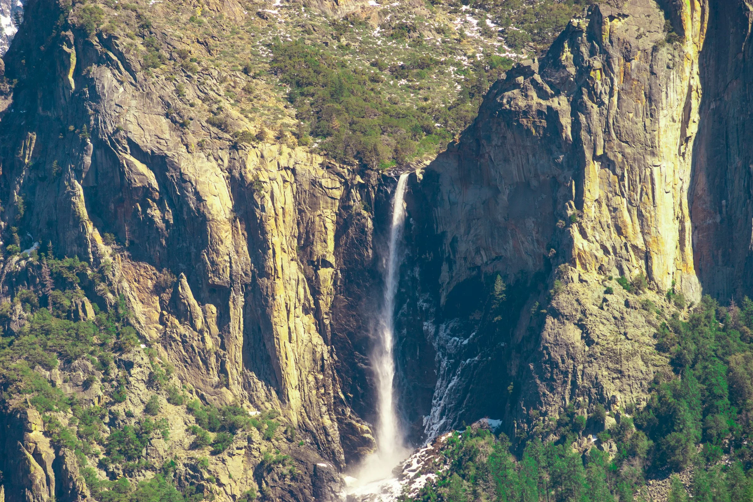Granite cliffs and waterfall above Yosemite Valley